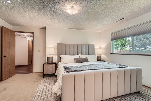 14905 SE Stevenson Dr, Vancouver, WA 98683 - carpeted bedroom with a textured ceiling and baseboards