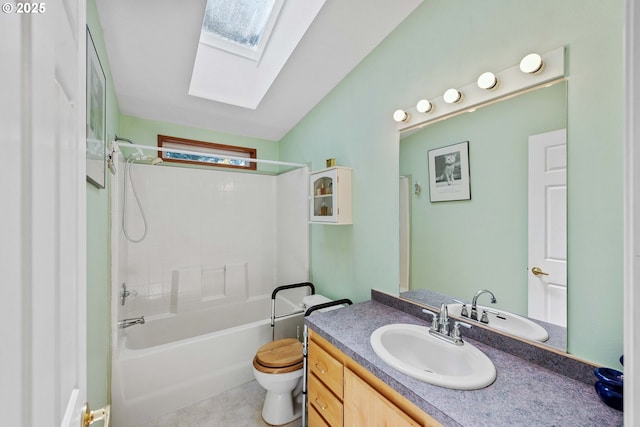 full bath featuring bathtub / shower combination, vanity, toilet, and a skylight