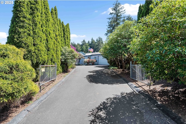 view of side of home featuring fence