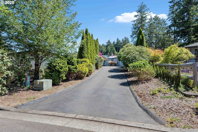 view of road with driveway