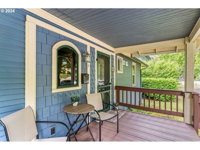 wooden terrace with covered porch
