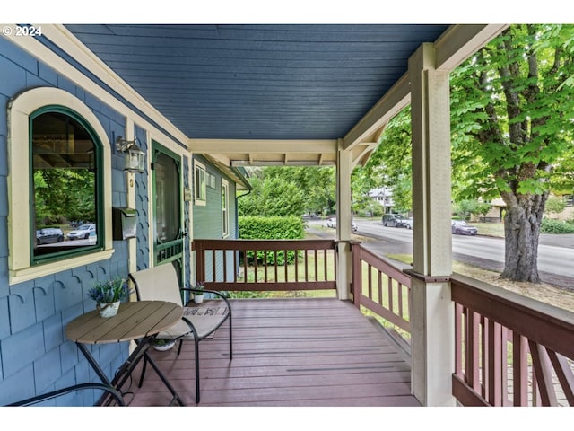 wooden deck with a porch