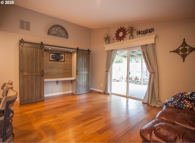 living room with light hardwood / wood-style flooring