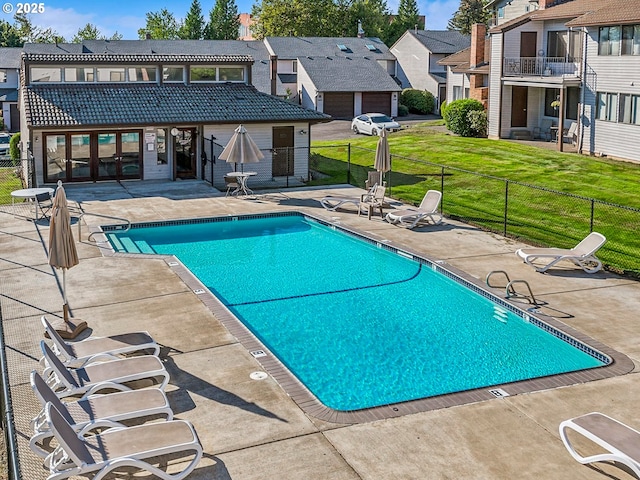12066 SE 104th Ct Unit 20, Happy Valley, OR 97086 - community pool with a patio area, a residential view, and french doors