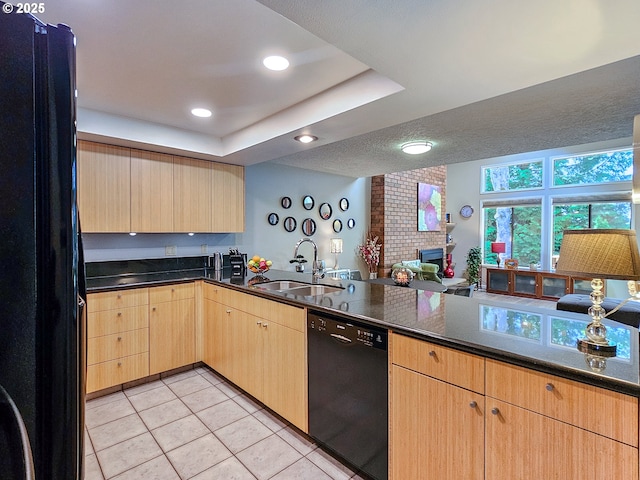 12066 SE 104th Ct Unit 20, Happy Valley, OR 97086 - kitchen with black appliances, light brown cabinetry, light tile patterned flooring, dark countertops, and recessed lighting