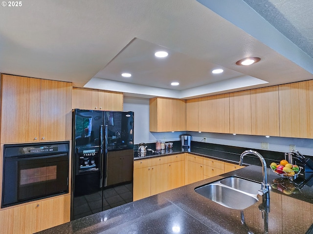 12066 SE 104th Ct Unit 20, Happy Valley, OR 97086 - kitchen with black appliances, a tray ceiling, light brown cabinetry, dark stone counters, and recessed lighting