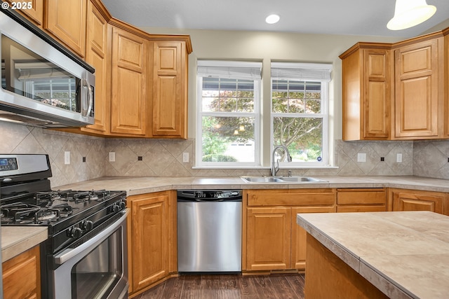 20021 Tharp Ct, Oregon City, OR 97045 - kitchen with appliances with stainless steel finishes, dark wood-type flooring, light countertops, tasteful backsplash, and recessed lighting