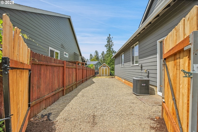 20021 Tharp Ct, Oregon City, OR 97045 - view of side of property featuring a shed and a central AC unit