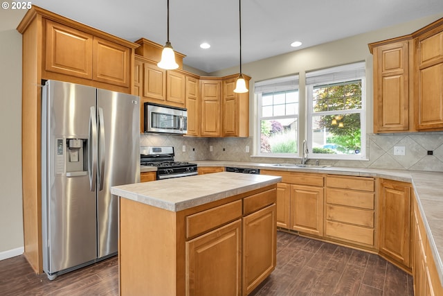 20021 Tharp Ct, Oregon City, OR 97045 - kitchen with stainless steel appliances, dark wood-type flooring, light countertops, decorative backsplash, and recessed lighting