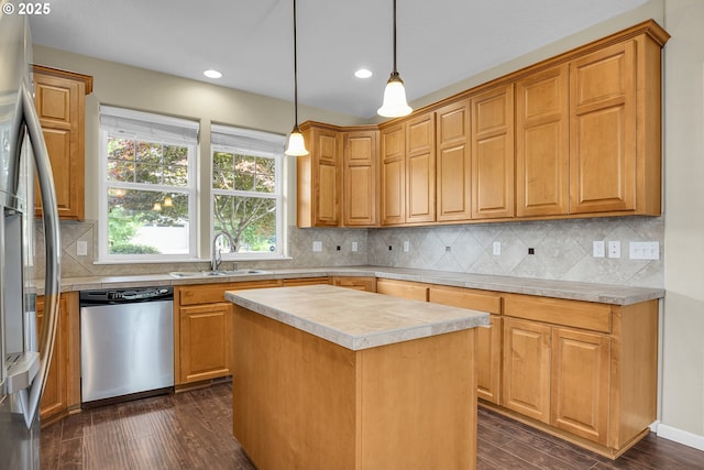 20021 Tharp Ct, Oregon City, OR 97045 - kitchen with appliances with stainless steel finishes, dark wood-style flooring, light countertops, recessed lighting, and backsplash