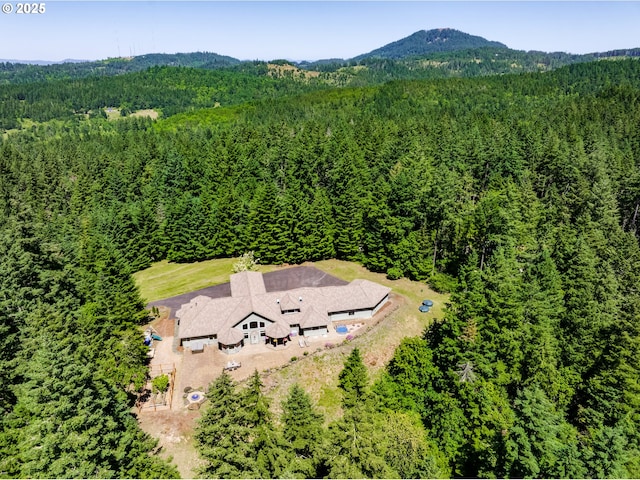 85339 Svarverud Rd, Eugene, OR 97405 - aerial view of property and surrounding area with a heavily wooded area and a mountainous background