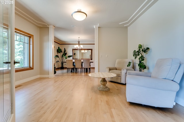 85339 Svarverud Rd, Eugene, OR 97405 - living area with a chandelier, wood finished floors, and baseboards