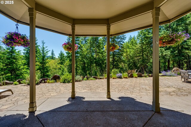 85339 Svarverud Rd, Eugene, OR 97405 - view of patio / terrace with view of wooded area