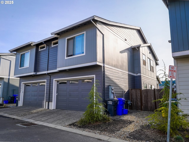 11473 SE Pleasant Valley Pkwy, Happy Valley, OR 97086 - view of front of house with a garage and driveway