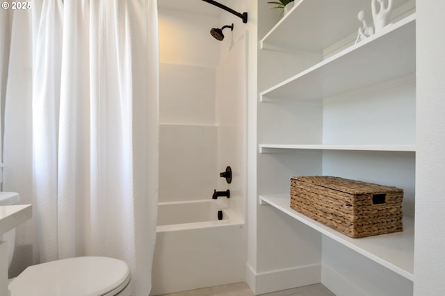 7265 SE Duke St Unit 2, Portland, OR 97206 - bathroom with shower / tub combo, toilet, and baseboards
