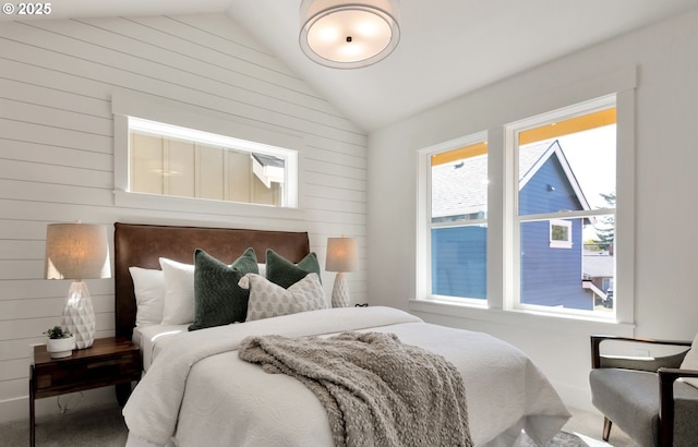 7265 SE Duke St Unit 2, Portland, OR 97206 - carpeted bedroom featuring vaulted ceiling and wood walls