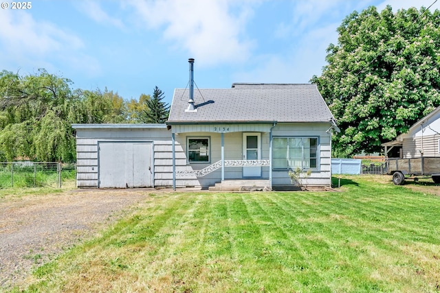 2134 Minnesota St, Eugene, OR 97402 - view of front of property with covered porch, driveway, roof with shingles, and a garage