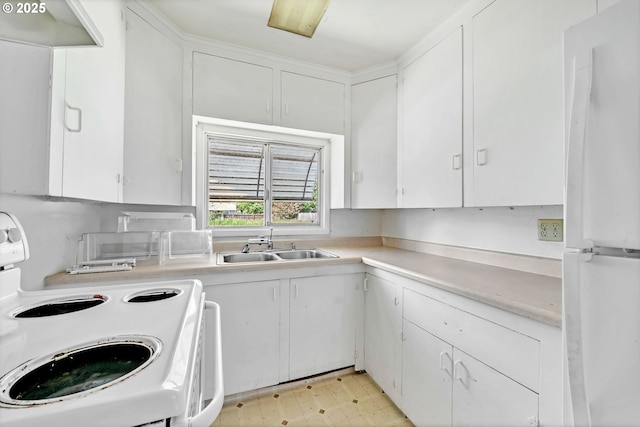 2134 Minnesota St, Eugene, OR 97402 - kitchen featuring white appliances, a sink, light countertops, and white cabinetry