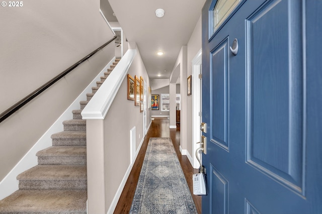 foyer entrance featuring dark hardwood / wood-style flooring