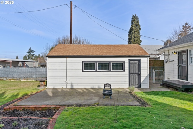 view of outbuilding with a yard