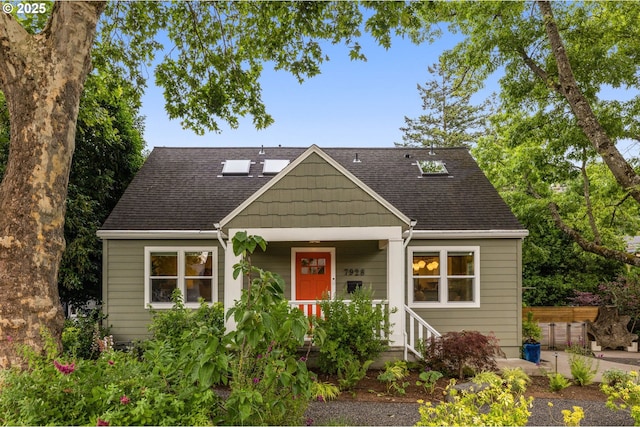 7928 SE 21st Ave, Portland, OR 97202 - view of front facade featuring a shingled roof and a porch