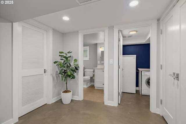 7928 SE 21st Ave, Portland, OR 97202 - hall with washer / dryer, recessed lighting, and concrete floors