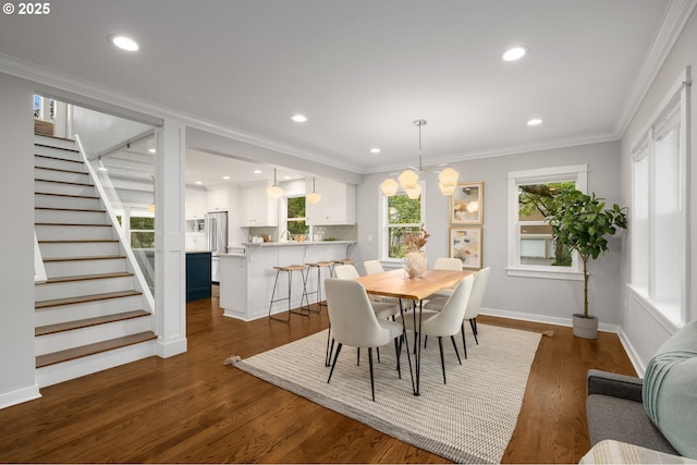 7928 SE 21st Ave, Portland, OR 97202 - dining area featuring dark wood-style flooring, stairs, crown molding, recessed lighting, and a chandelier