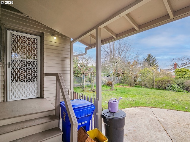 view of patio / terrace featuring fence