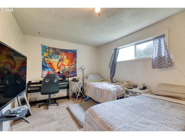 carpeted bedroom featuring a textured ceiling