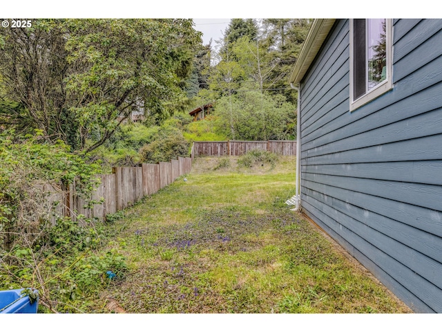 view of yard featuring fence