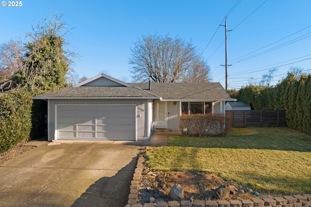 ranch-style house with a garage and a front lawn