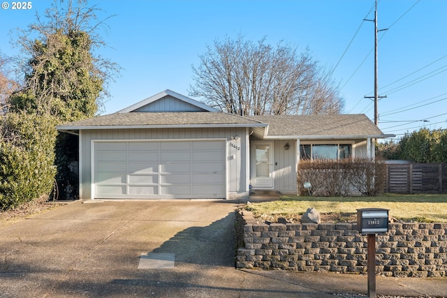 single story home featuring a garage