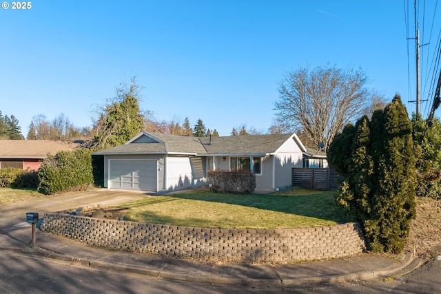 single story home with a garage and a front lawn