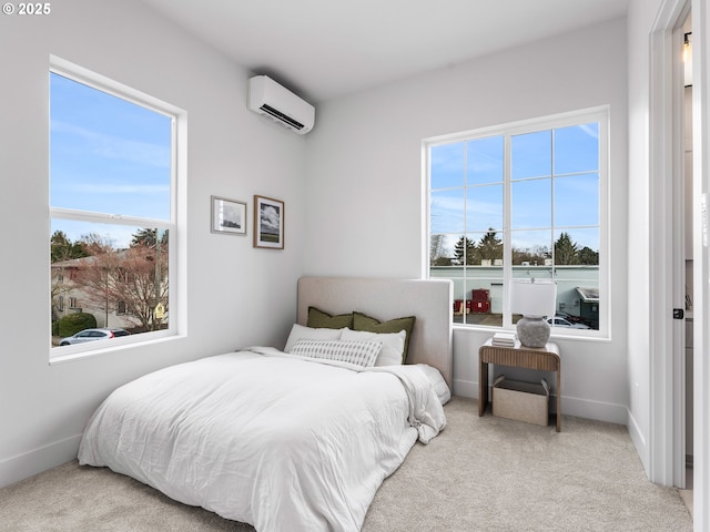 carpeted bedroom with a wall mounted AC