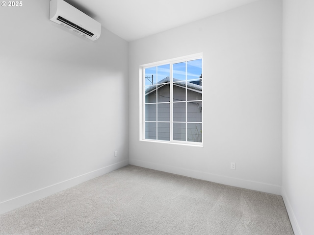 empty room featuring carpet floors and a wall mounted air conditioner