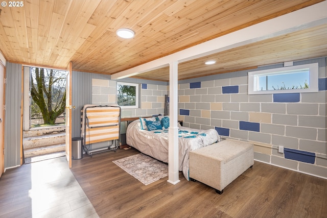 bedroom featuring wood finished floors, wood ceiling, and recessed lighting