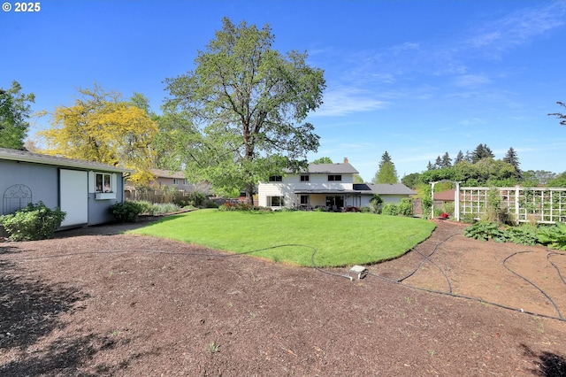view of yard with fence