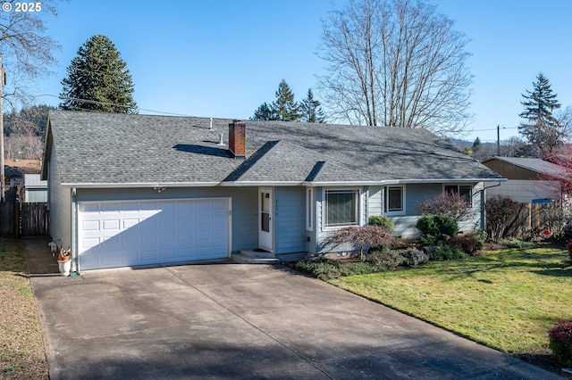 ranch-style house with a garage and a front lawn