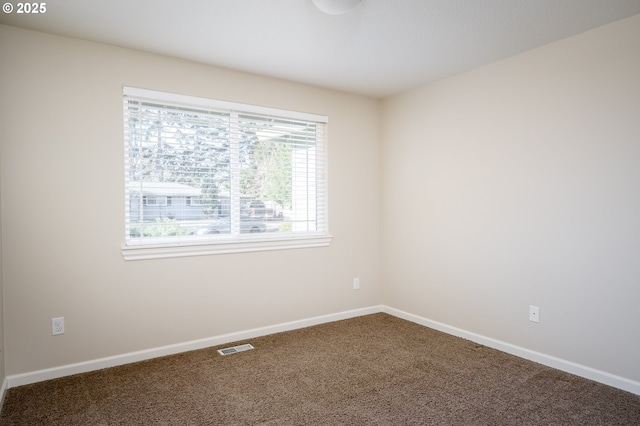 view of carpeted spare room