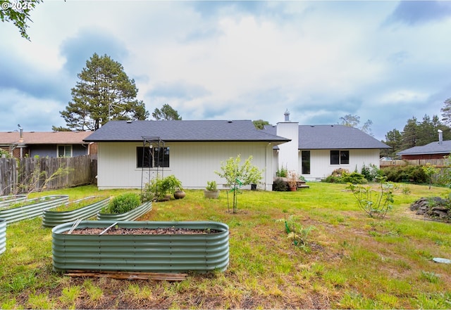 4045 Spruce St, Florence, OR 97439 - back of house featuring a garden