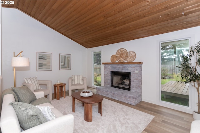 living room with wooden ceiling, a fireplace, lofted ceiling, and wood finished floors