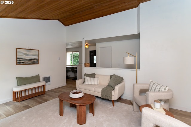 4045 Spruce St, Florence, OR 97439 - living area featuring wooden ceiling, lofted ceiling, wood finished floors, and baseboards