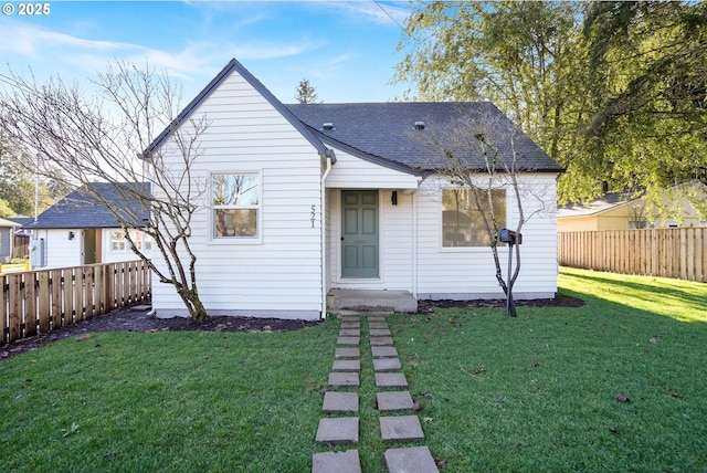 view of front of home with a front yard