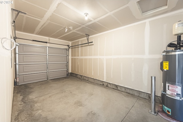 garage featuring strapped water heater