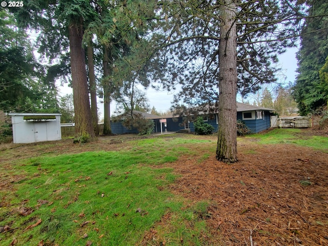 view of yard with fence