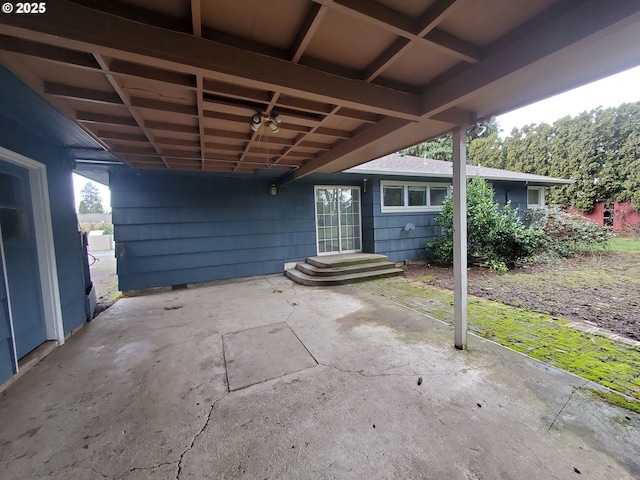 view of patio featuring a carport