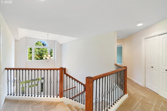 16273 Barlow Dr, Oregon City, OR 97045 - hall with an upstairs landing, carpet, and a chandelier