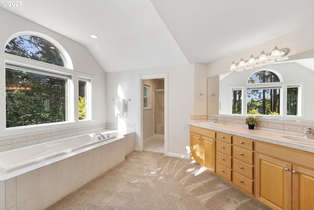 16273 Barlow Dr, Oregon City, OR 97045 - bathroom featuring lofted ceiling, double vanity, and a bath