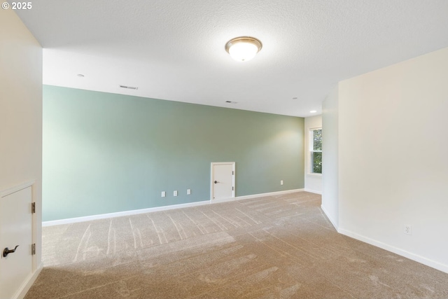16273 Barlow Dr, Oregon City, OR 97045 - spare room featuring carpet flooring and baseboards