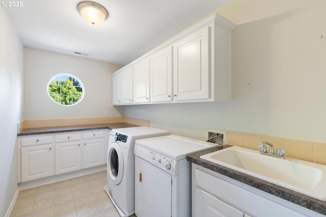 16273 Barlow Dr, Oregon City, OR 97045 - washroom featuring cabinet space and separate washer and dryer